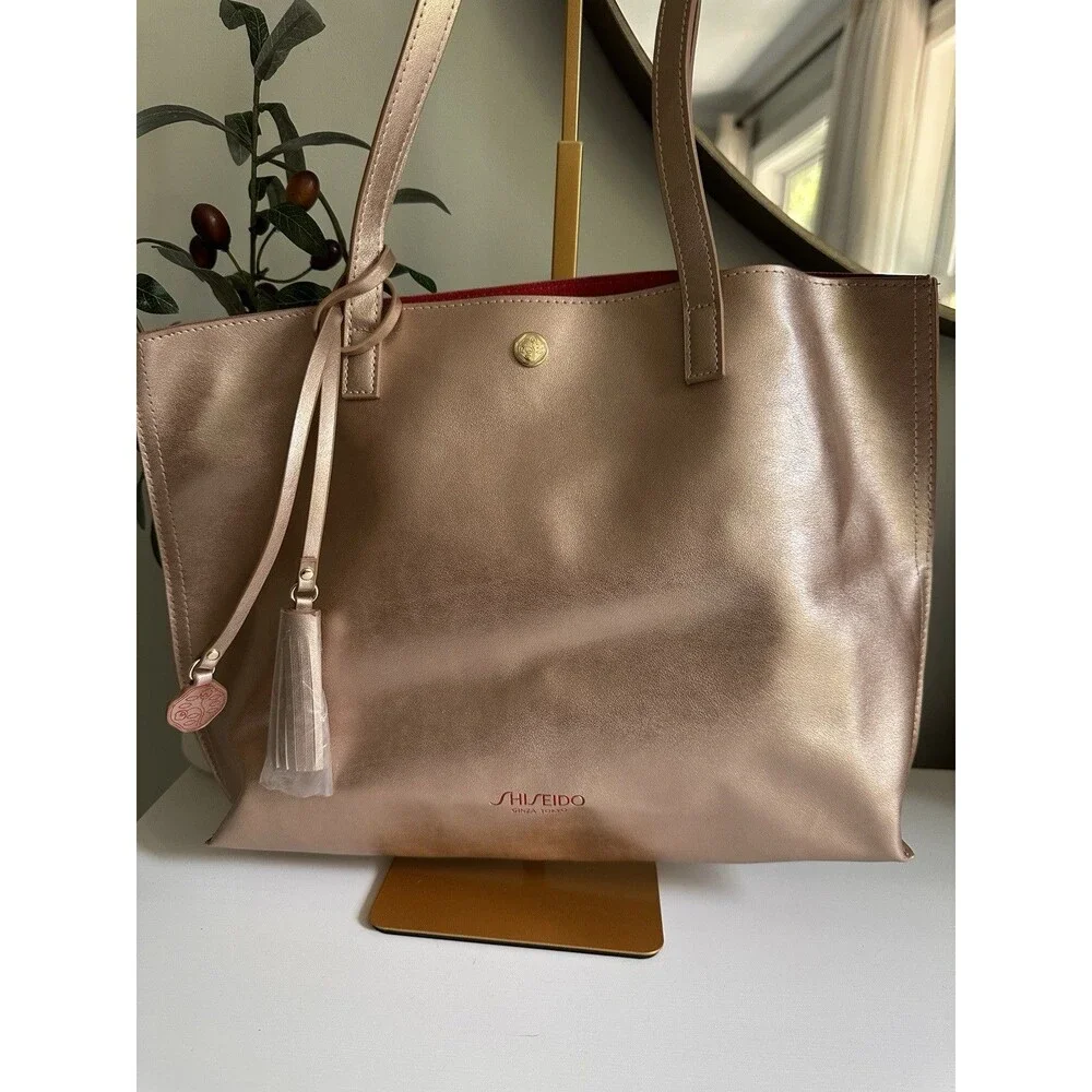 Shiseido Ginza Tokyo Metallic Rose Gold Tote Bag with Tassel NWOT